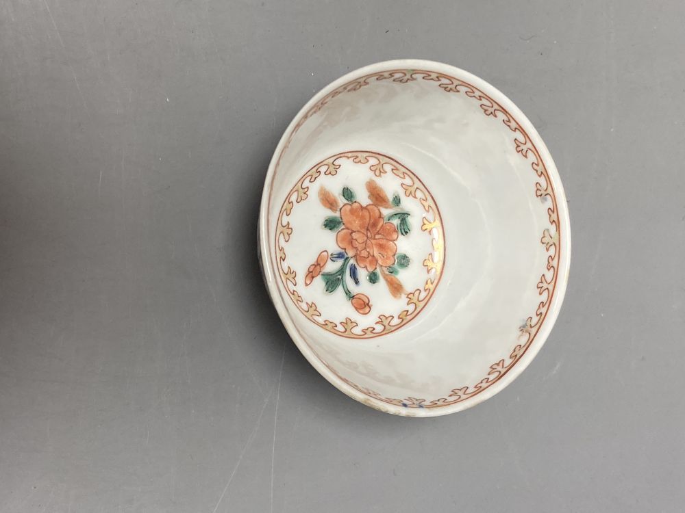 An 18th century Chinese famille rose bowl, 11.5cm diameter, and three smaller Chinese porcelain bowls